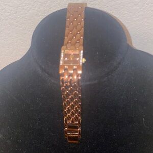 Nolan Miller Elegant Gold-Tone Women Watch with Crystal Accents